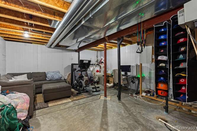 8354 Dove Ridge Way Parker, CO 80134 - Photo 31 of 38 a view of storage and utility room