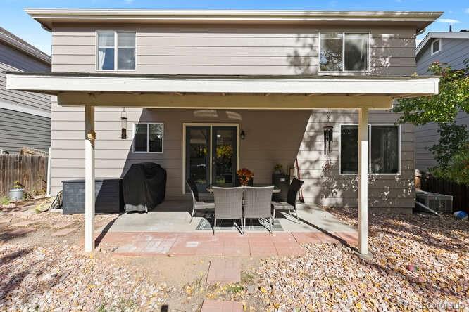 8354 Dove Ridge Way Parker, CO 80134 - Photo 34 of 38 a view of a house with outdoor seating space