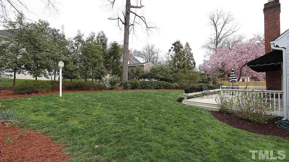 2319 Hales Road Raleigh, NC 27608 - Photo 18 of 20 a view of a yard with large trees