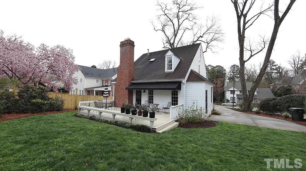 2319 Hales Road Raleigh, NC 27608 - Photo 20 of 20 a front view of a house with garden
