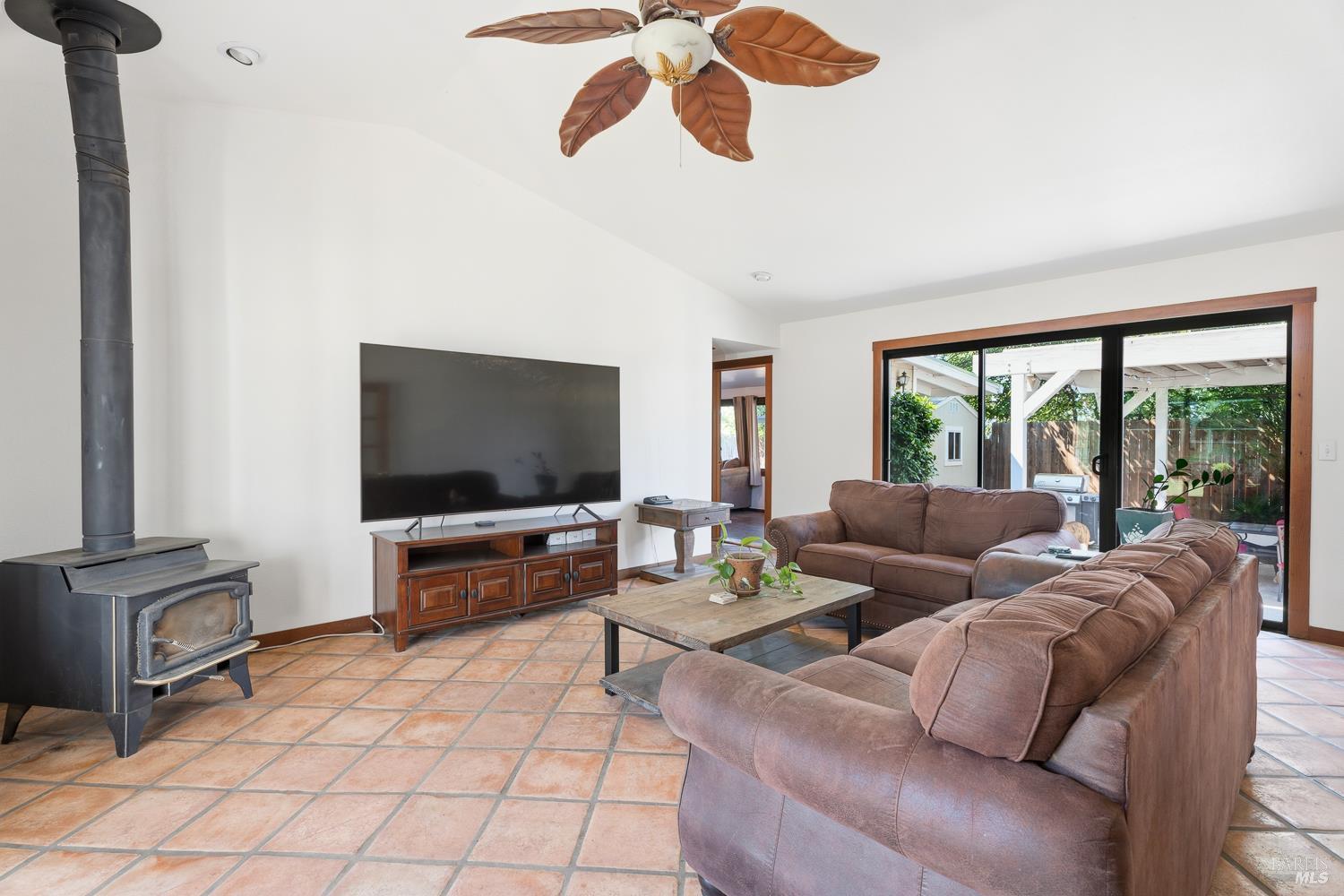 2260 Old River Road Ukiah, CA 95482 - Photo 25 of 29 a living room with furniture and a flat screen tv