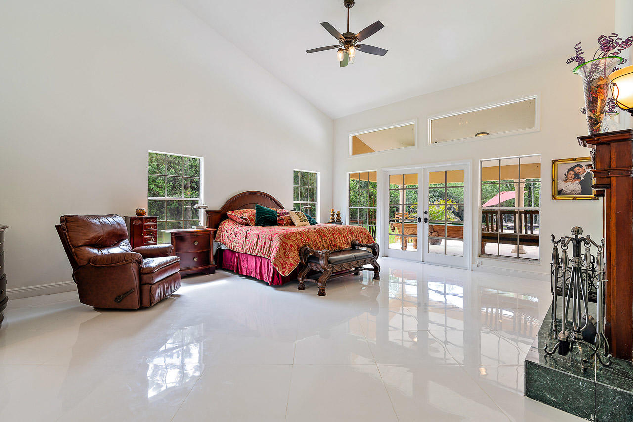 1712 Southeast Colony Way Jupiter, FL 33478 - Photo 13 of 21 Master Bedroom