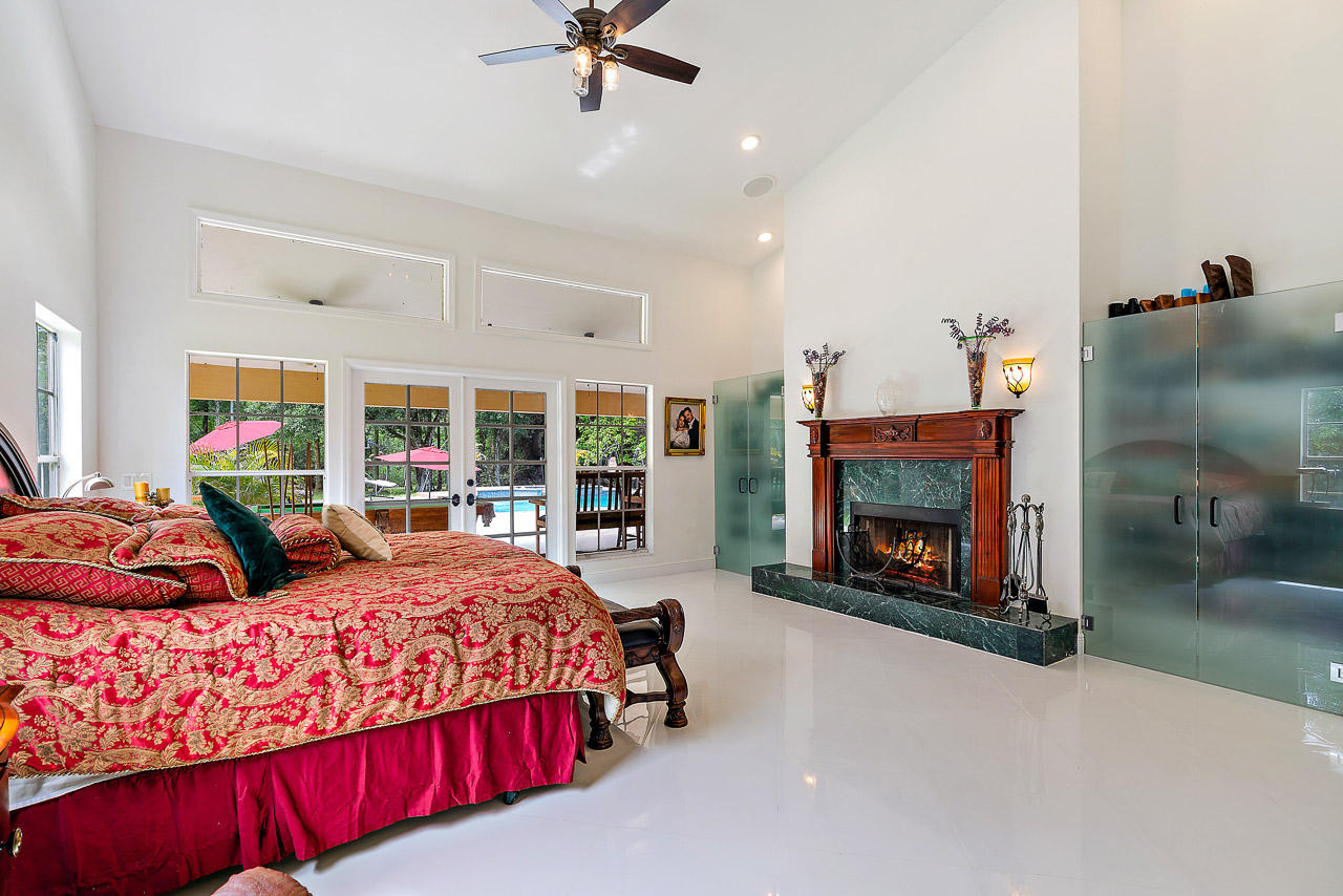 1712 Southeast Colony Way Jupiter, FL 33478 - Photo 14 of 21 Master Bedroom