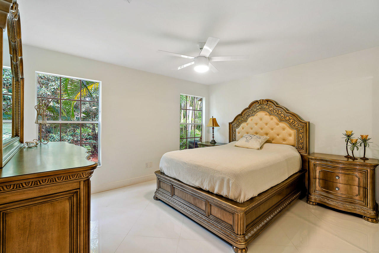 1712 Southeast Colony Way Jupiter, FL 33478 - Photo 16 of 21 Bedroom
