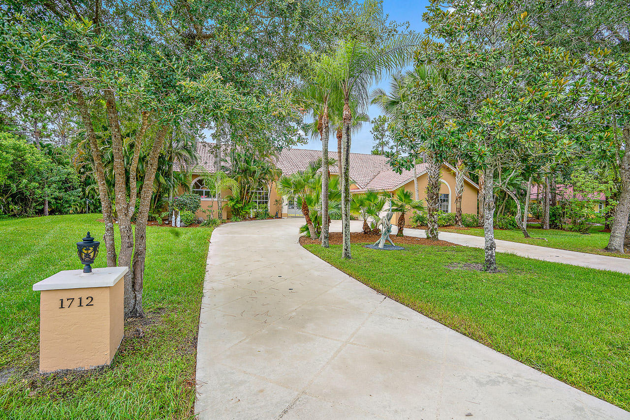 1712 Southeast Colony Way Jupiter, FL 33478 - Photo 20 of 21 Front Entrance