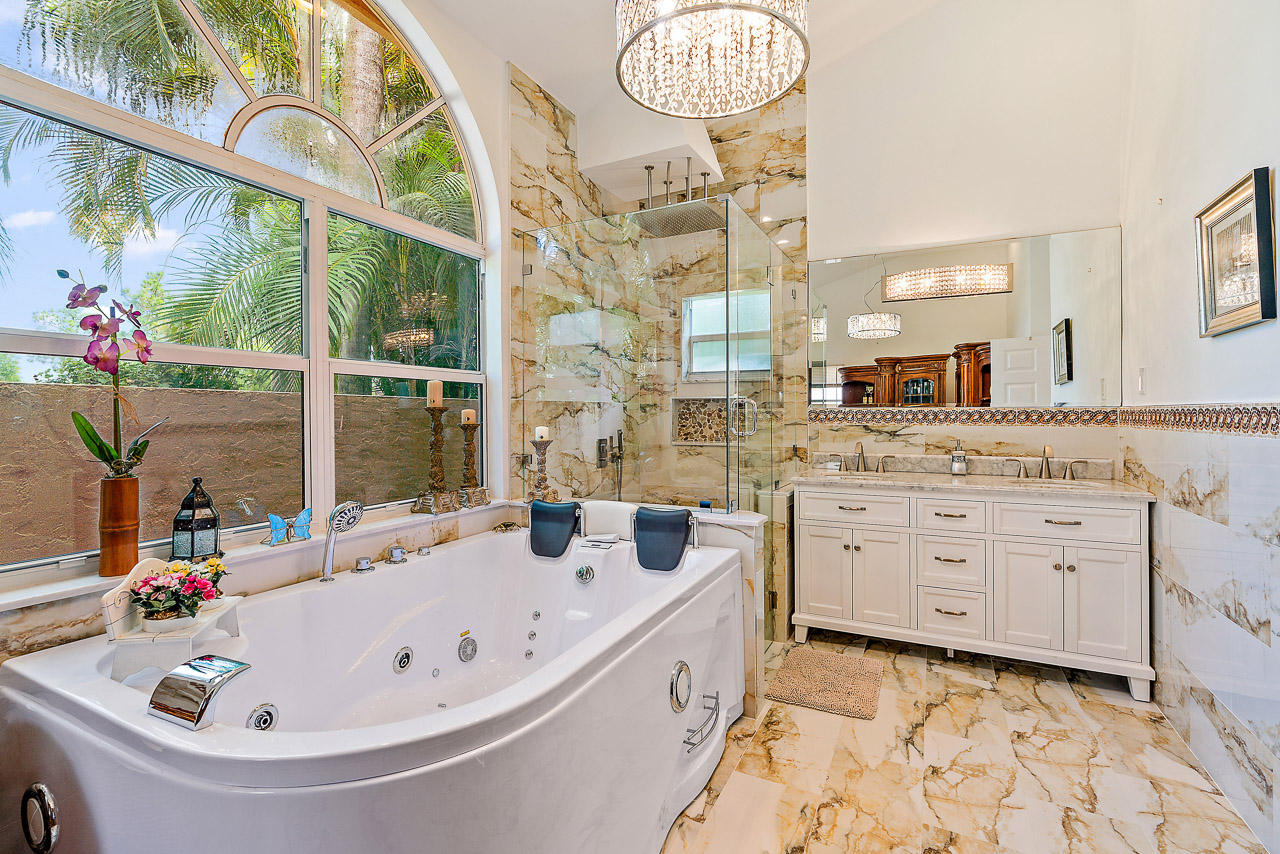 1712 Southeast Colony Way Jupiter, FL 33478 - Photo 4 of 21 Master Bathroom