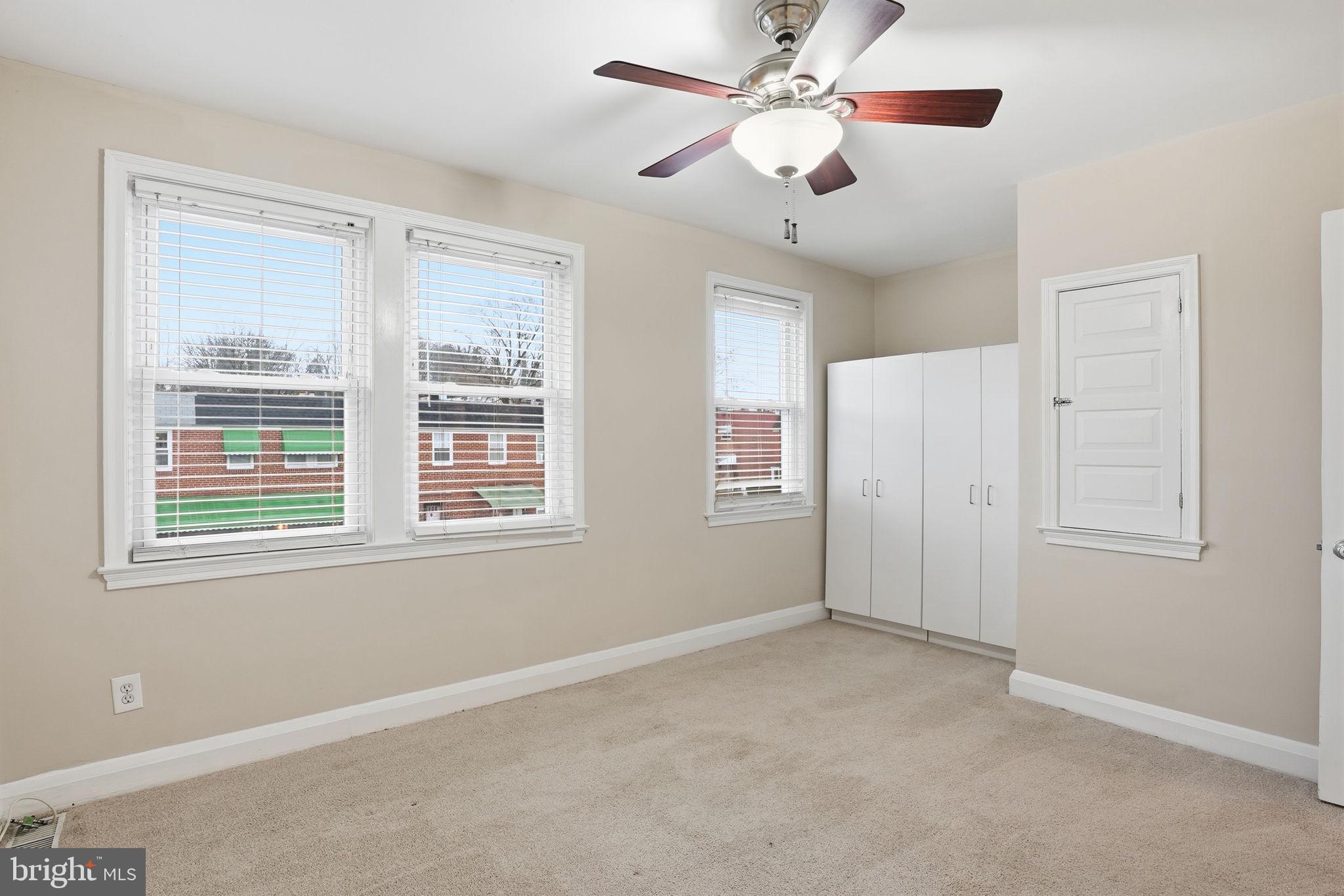 4306 Newport Avenue Baltimore, MD 21211 - Photo 19 of 44 a view of an empty room with a window