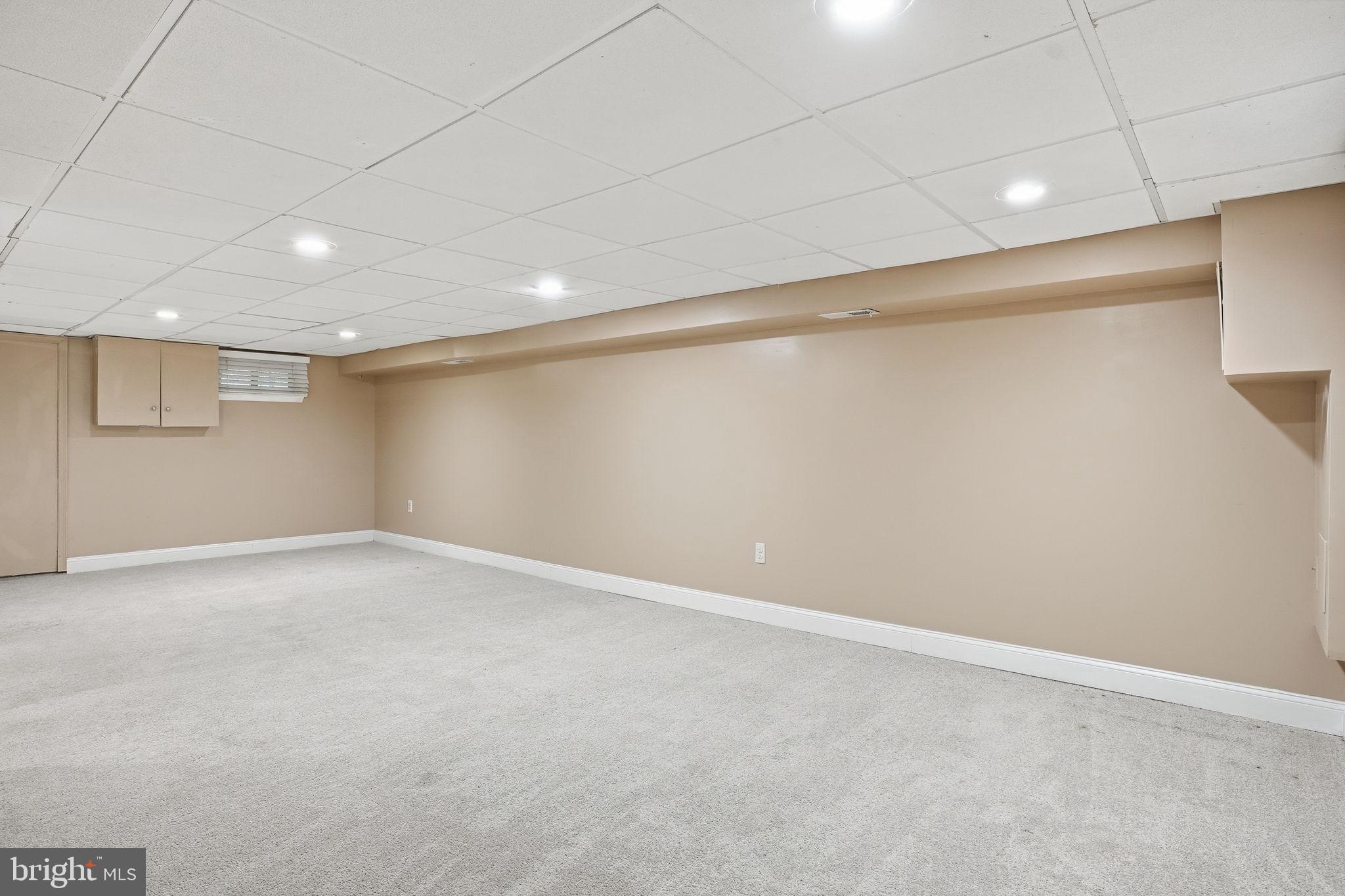 4306 Newport Avenue Baltimore, MD 21211 - Photo 26 of 44 a view of an empty room with a window