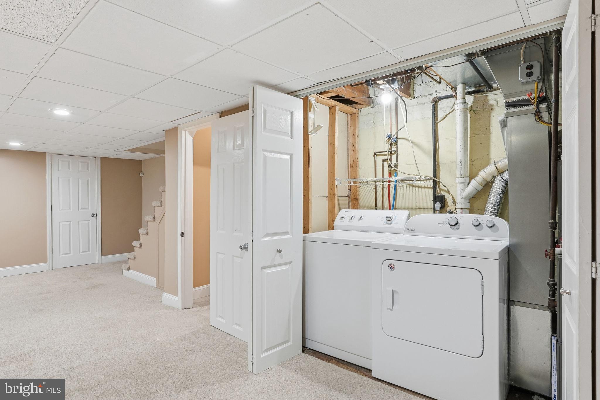 4306 Newport Avenue Baltimore, MD 21211 - Photo 29 of 44 a bathroom with a sink and a mirror