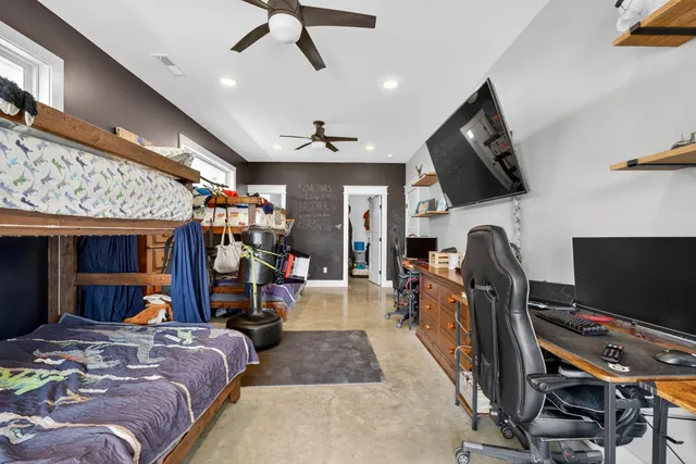 a kitchen with stainless steel appliances white cabinets and a stove