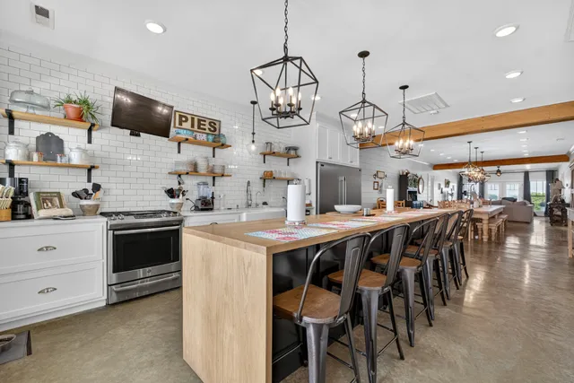 a bedroom with a bed and a mirror