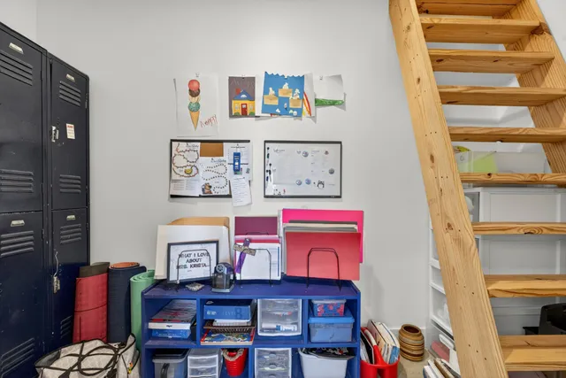 a view of a swimming pool with an outdoor seating