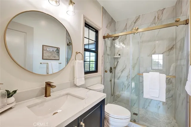 a view of a livingroom with furniture and a window