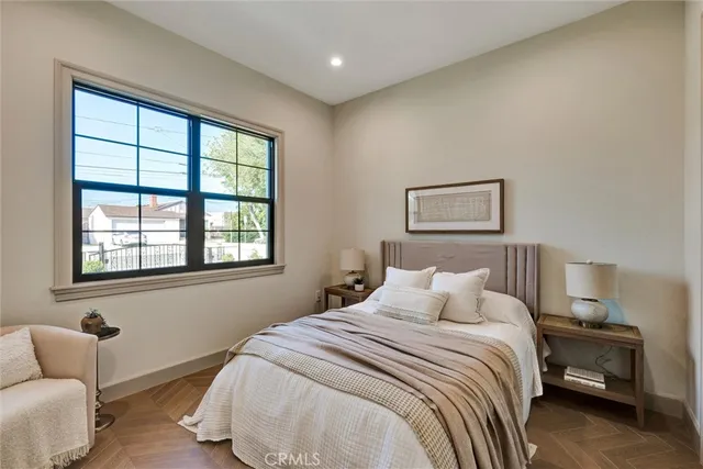a view of a hallway with seating area