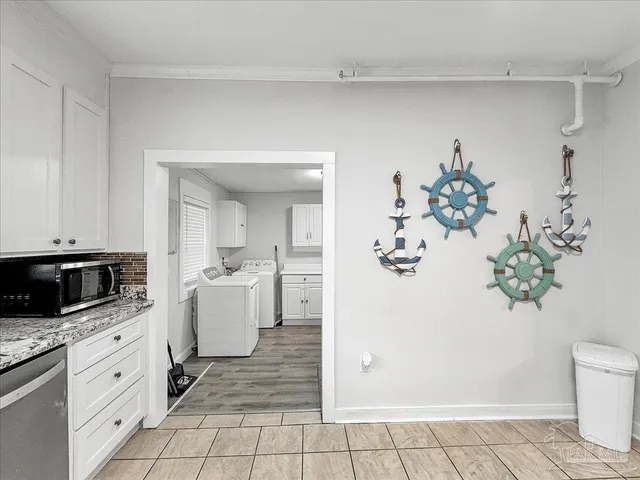 a view of living room and kitchen with flat screen tv