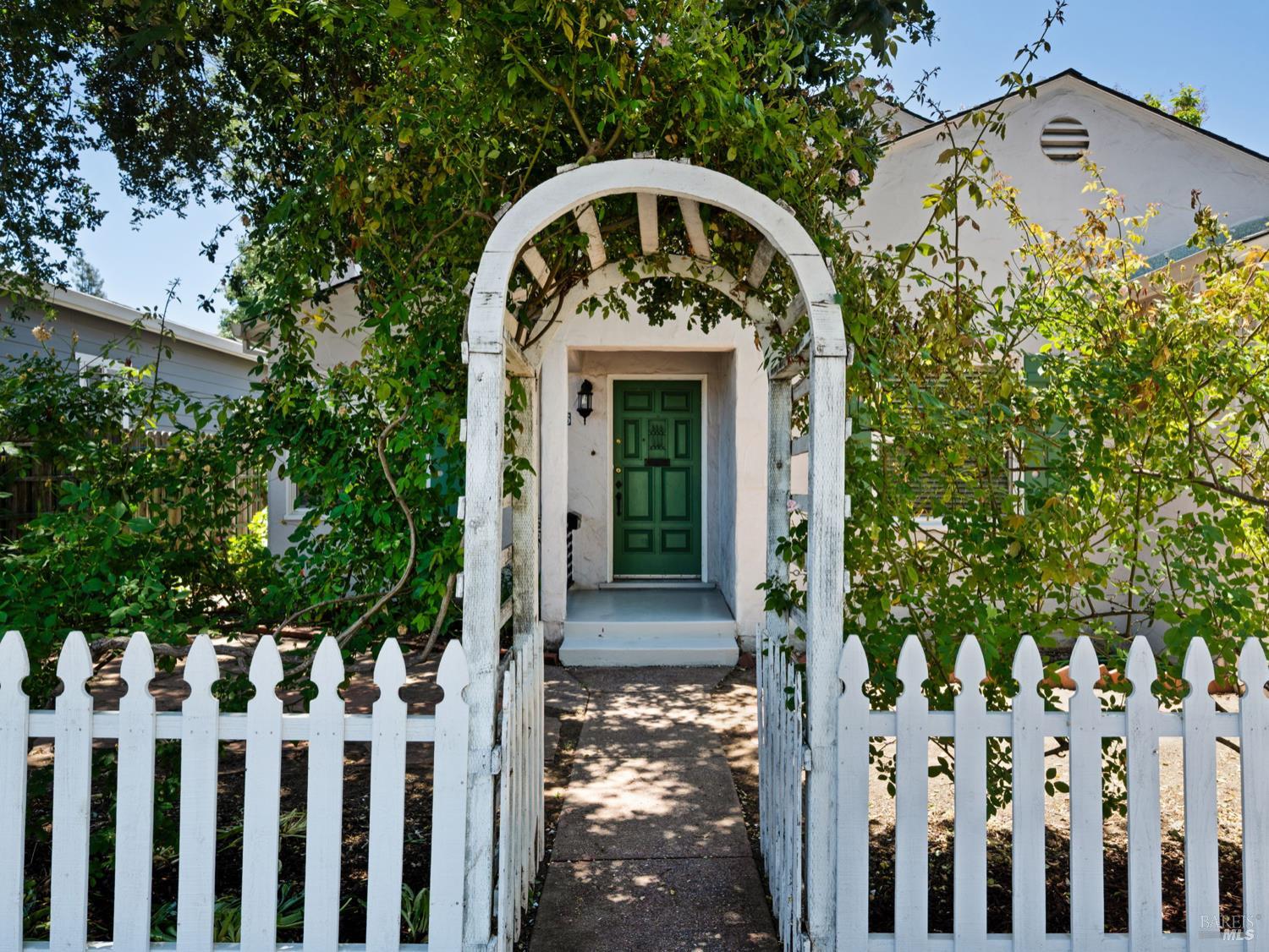 636 Dexter Street Santa Rosa, CA 95404 - Photo 1 of 1 a front view of a house with a garden