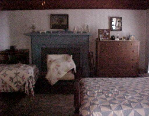 1980 Mosco Road Axton, VA 24054 - Photo 4 of 5 a living room with furniture and a fireplace