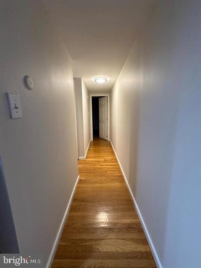 326 Queen Street, Unit 6 Philadelphia, PA 19147 - Photo 7 of 12 a view of a hallway with wooden floor