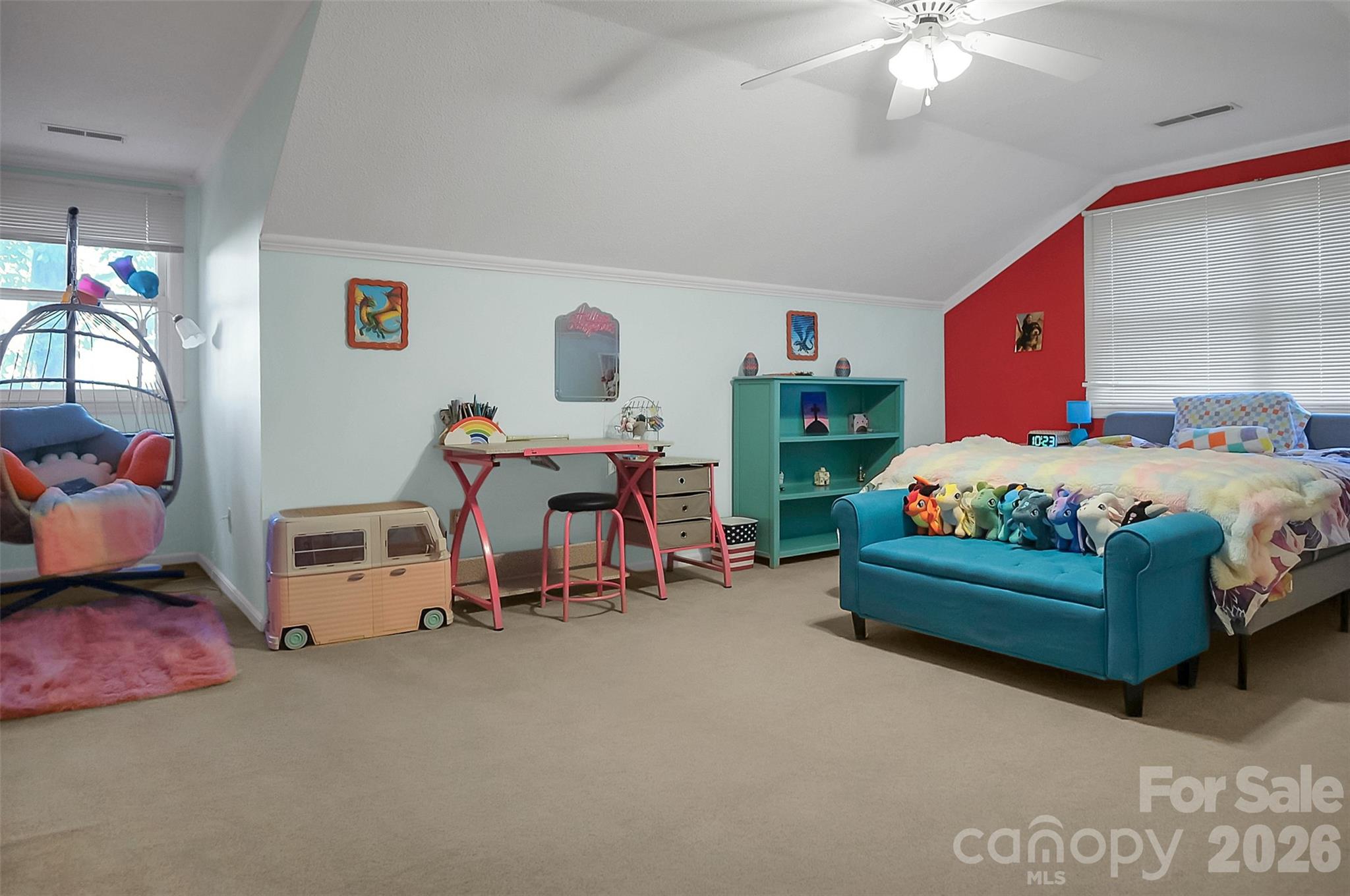 808 Old Mt Holly Road Stanley, NC 28164 - Photo 41 of 48 a bedroom with bed and a chandelier