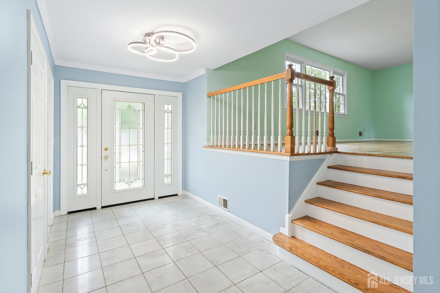 10 Woodruff Road Edison, NJ 08820 - Photo 3 of 18 a view of a livingroom with stairs