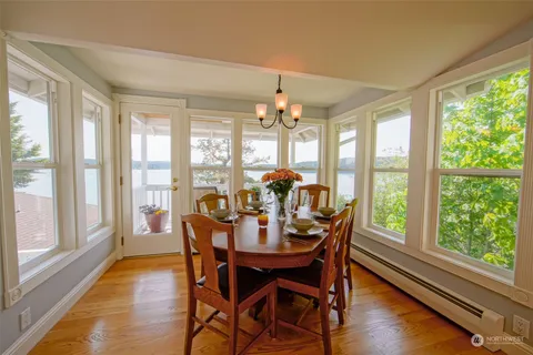 a view of a balcony with wooden floor