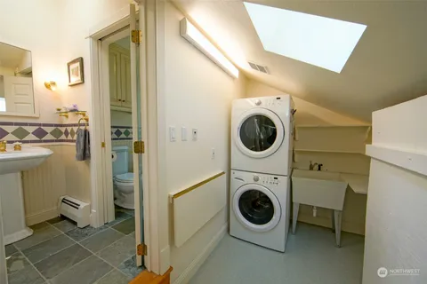 a bathroom with a sink and mirror