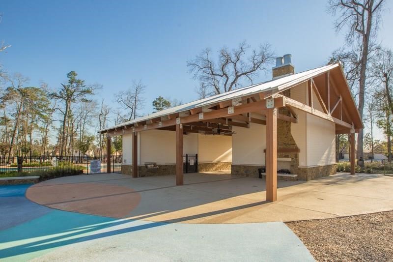 4408 Mimic Drive Spring, TX 77386 - Photo 24 of 27 a view of a house with a backyard