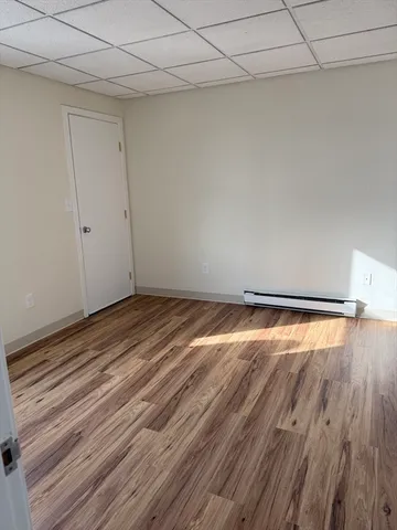 a view of a room with racks on the wall