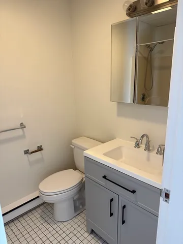 a view of a storage and utility room with washer and dryer
