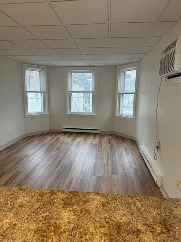 a view of a kitchen from the hallway