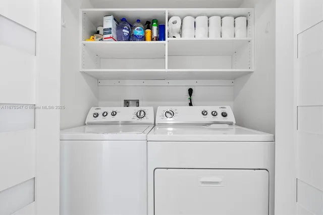 a utility room with dryer and washer