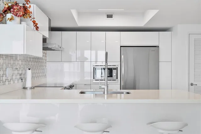 a bathroom with a bathtub and a sink