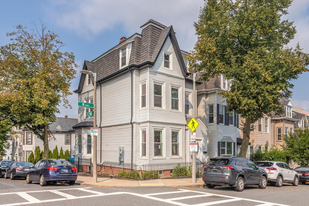 a car parked in front of a building