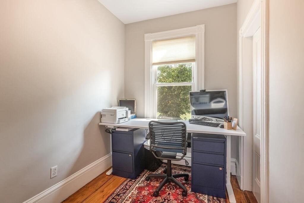 45 M Street Boston, MA 02127 - Photo 20 of 42 a view of a workspace with furniture and a window
