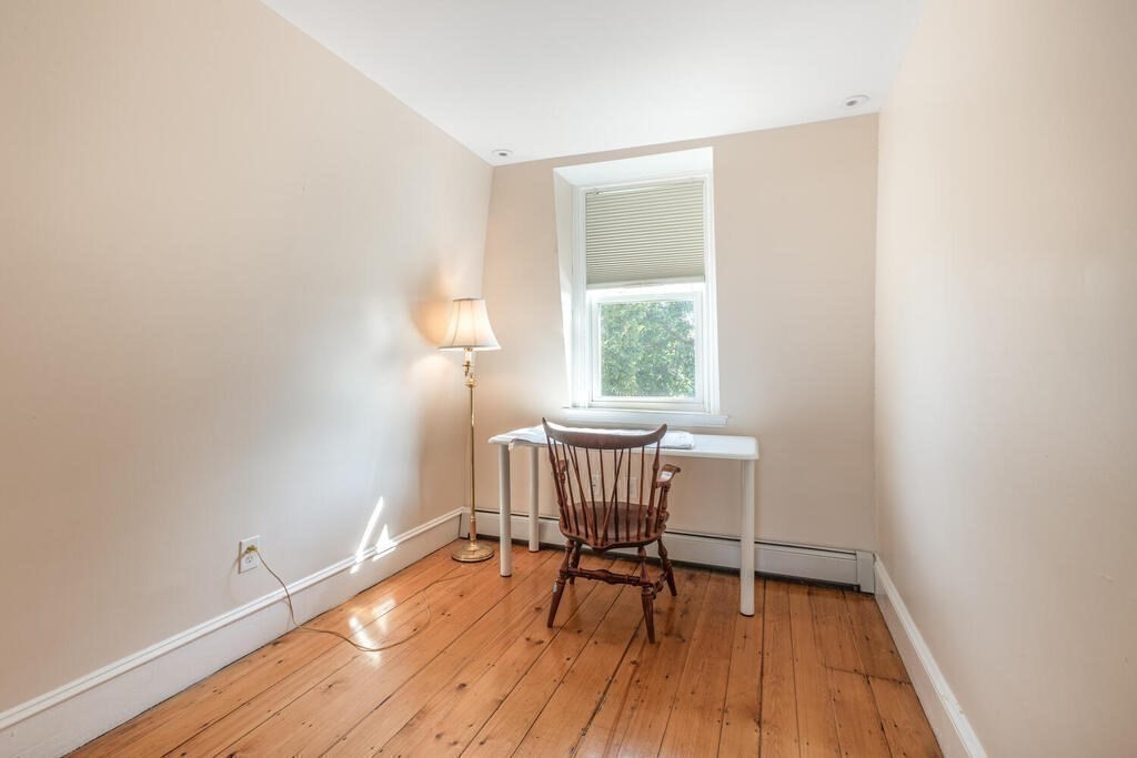 45 M Street Boston, MA 02127 - Photo 24 of 42 a view of a room with wooden floor and a window