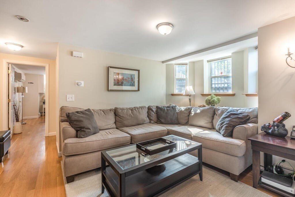 45 M Street Boston, MA 02127 - Photo 25 of 42 a living room with furniture and a couch