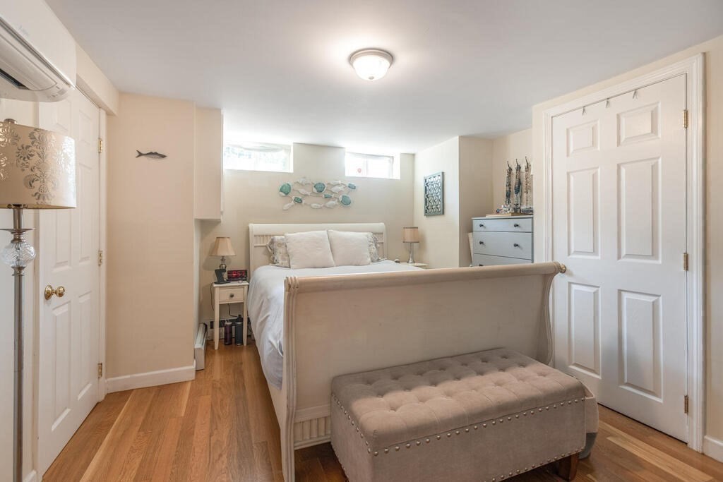 45 M Street Boston, MA 02127 - Photo 29 of 42 a room with a bed and a table