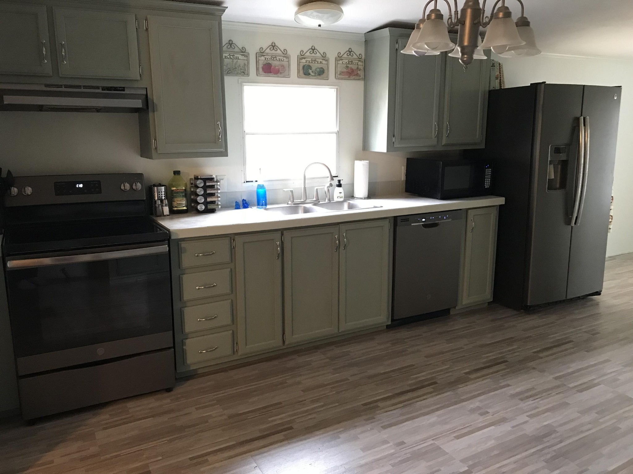 139 Knight Road Dunlap, TN 37327 - Photo 8 of 30 a kitchen with a refrigerator sink and cabinets