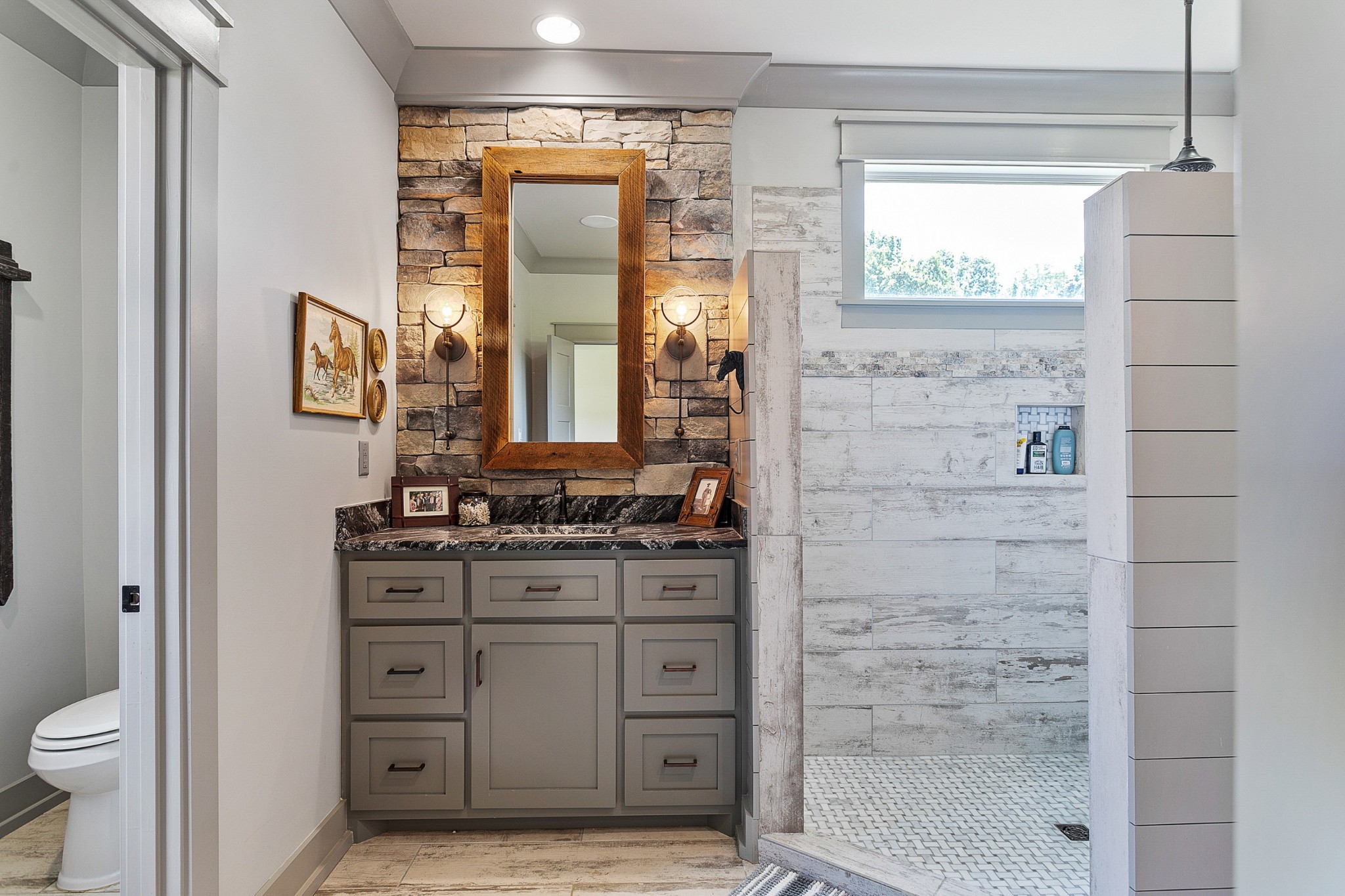 790 Baker Road Columbia, TN 38401 - Photo 25 of 69 a bathroom with a toilet a sink and shower