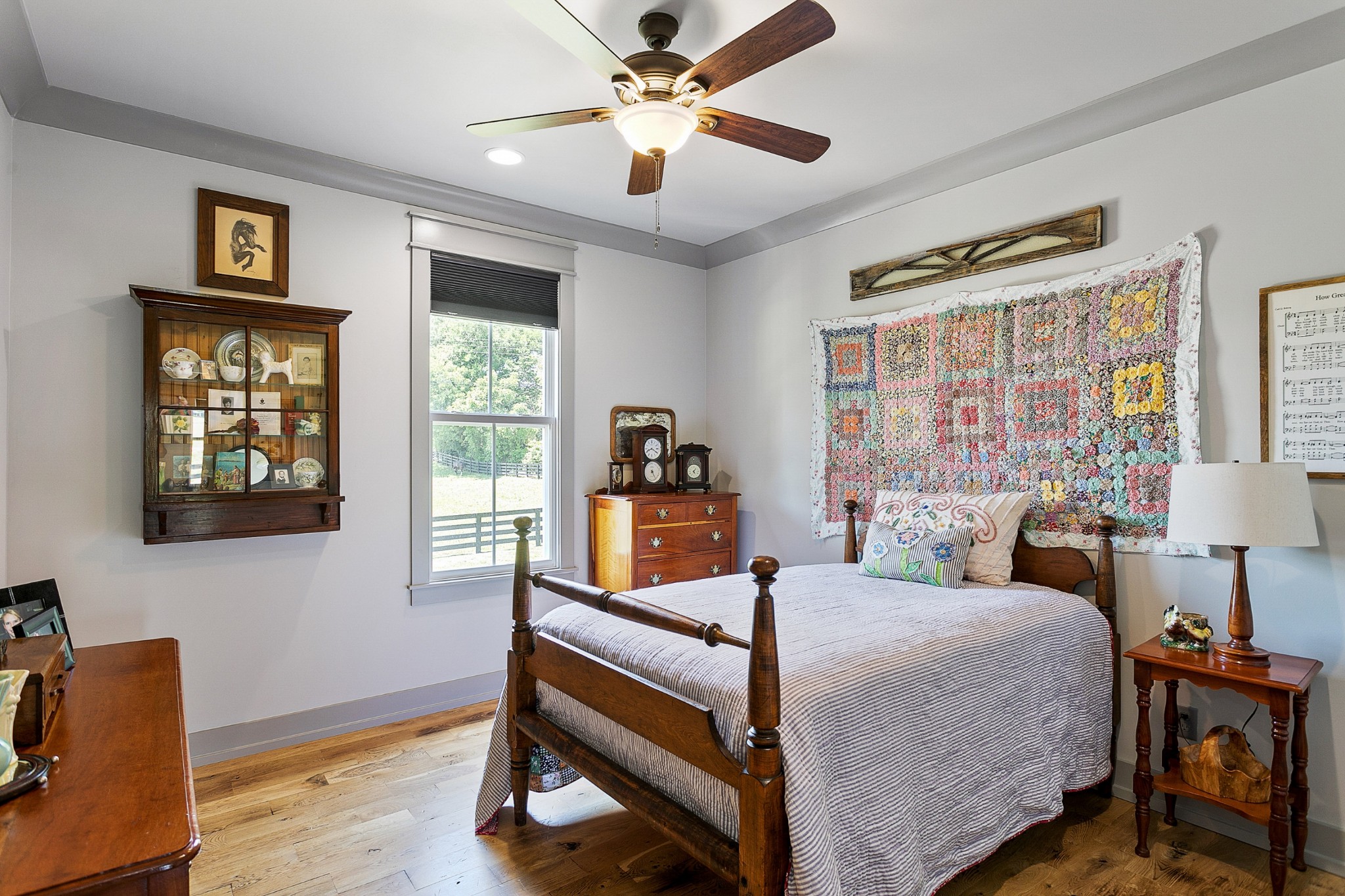 790 Baker Road Columbia, TN 38401 - Photo 31 of 69 a bedroom with a bed and wooden floor