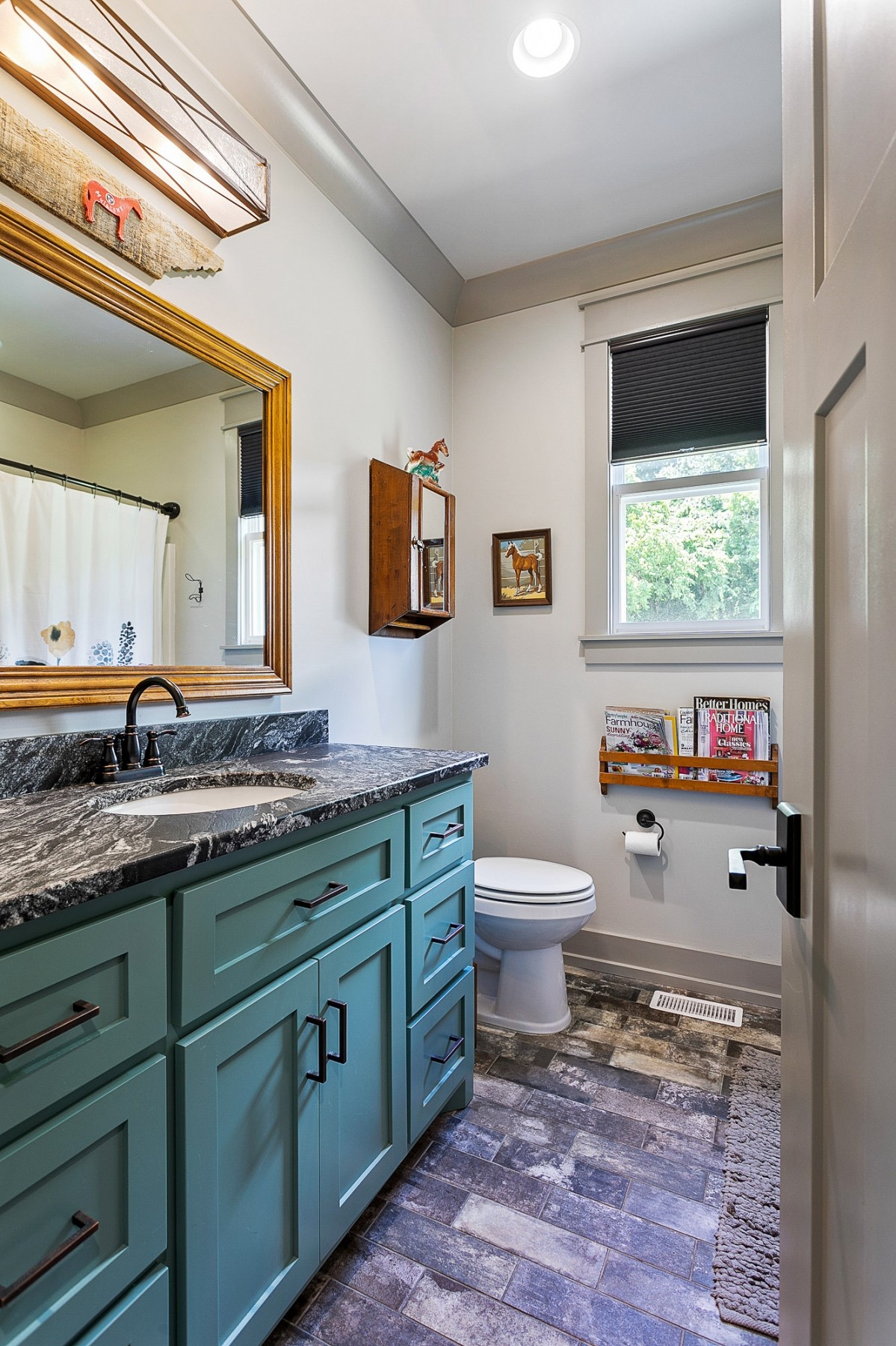 790 Baker Road Columbia, TN 38401 - Photo 33 of 69 a bathroom with a granite countertop toilet sink and mirror