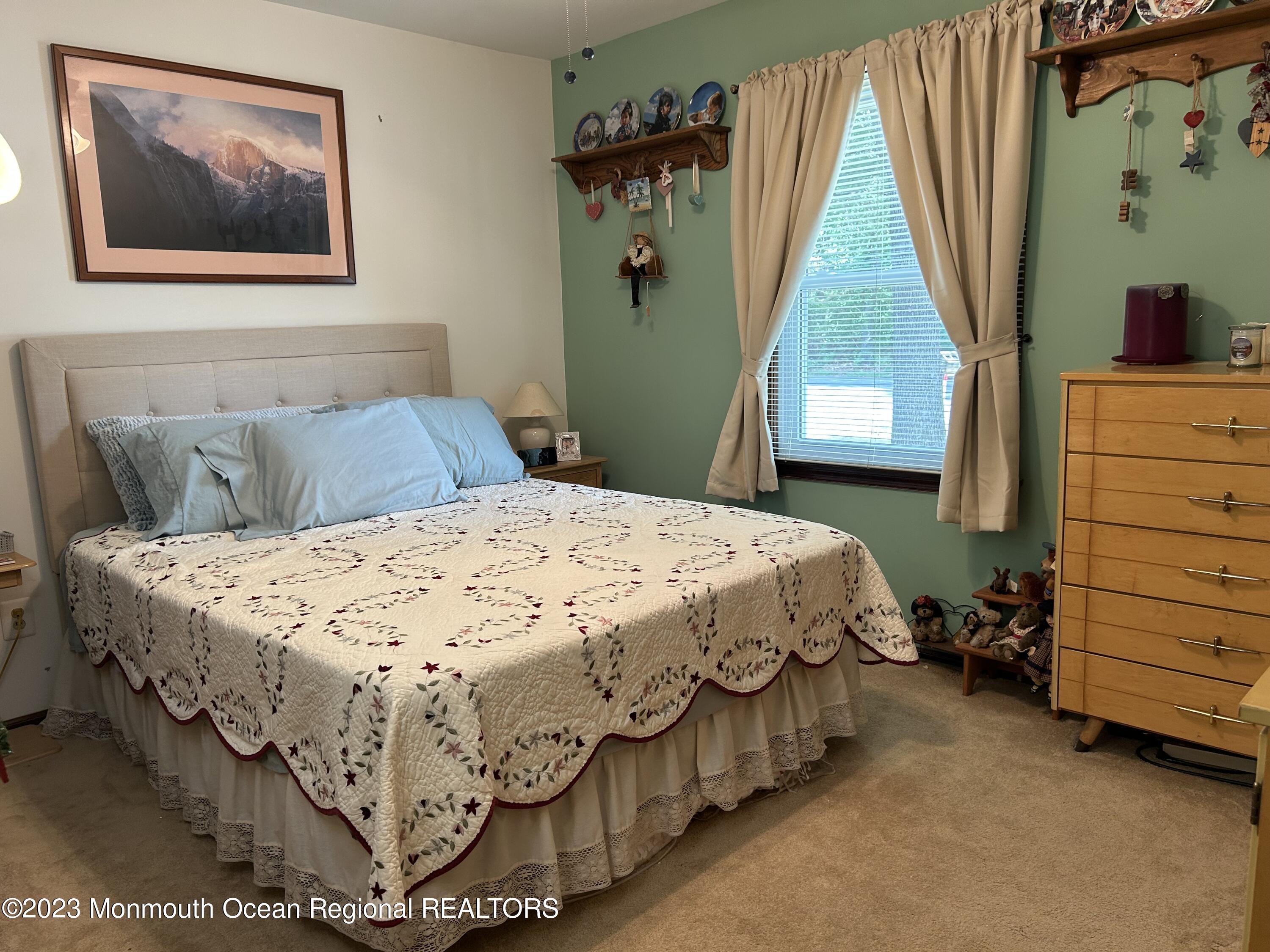 1635 Burrsville Road Brick, NJ 08724 - Photo 11 of 15 a bedroom with a bed and a window