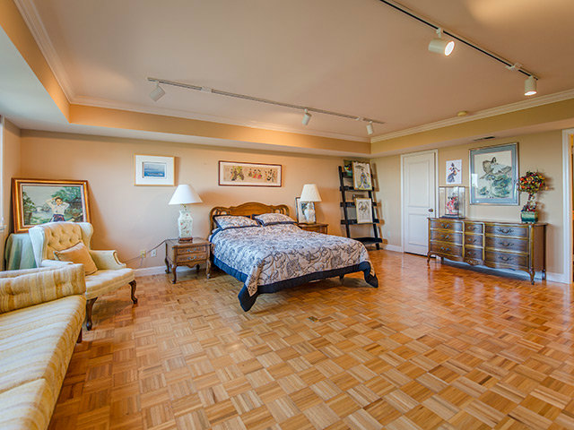 150 New Place Road Hillsborough, CA 94010 - Photo 16 of 25 a bedroom with a bed and wooden floor