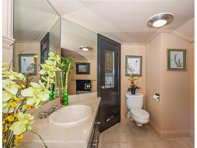 150 New Place Road Hillsborough, CA 94010 - Photo 20 of 25 a bathroom with a sink a toilet and shower