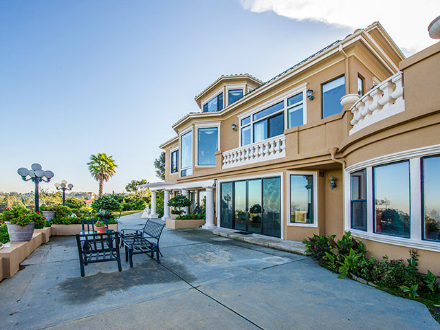 150 New Place Road Hillsborough, CA 94010 - Photo 21 of 25 a view of a building with a garden and sitting area