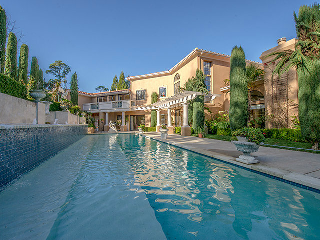 150 New Place Road Hillsborough, CA 94010 - Photo 22 of 25 a view of a house with a swimming pool
