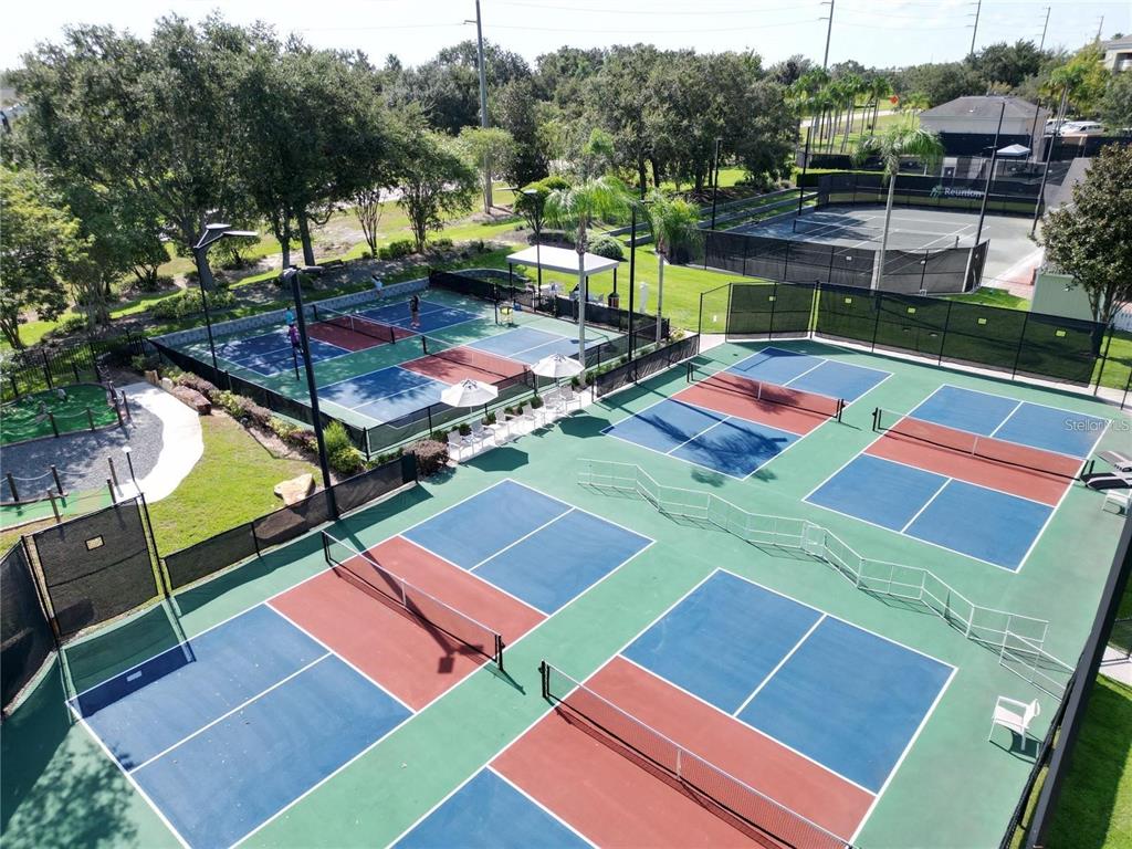 7770 Sandy Ridge Drive, Unit 227 Reunion, FL 34747 - Photo 32 of 33 a view of an outdoor space and a swimming pool
