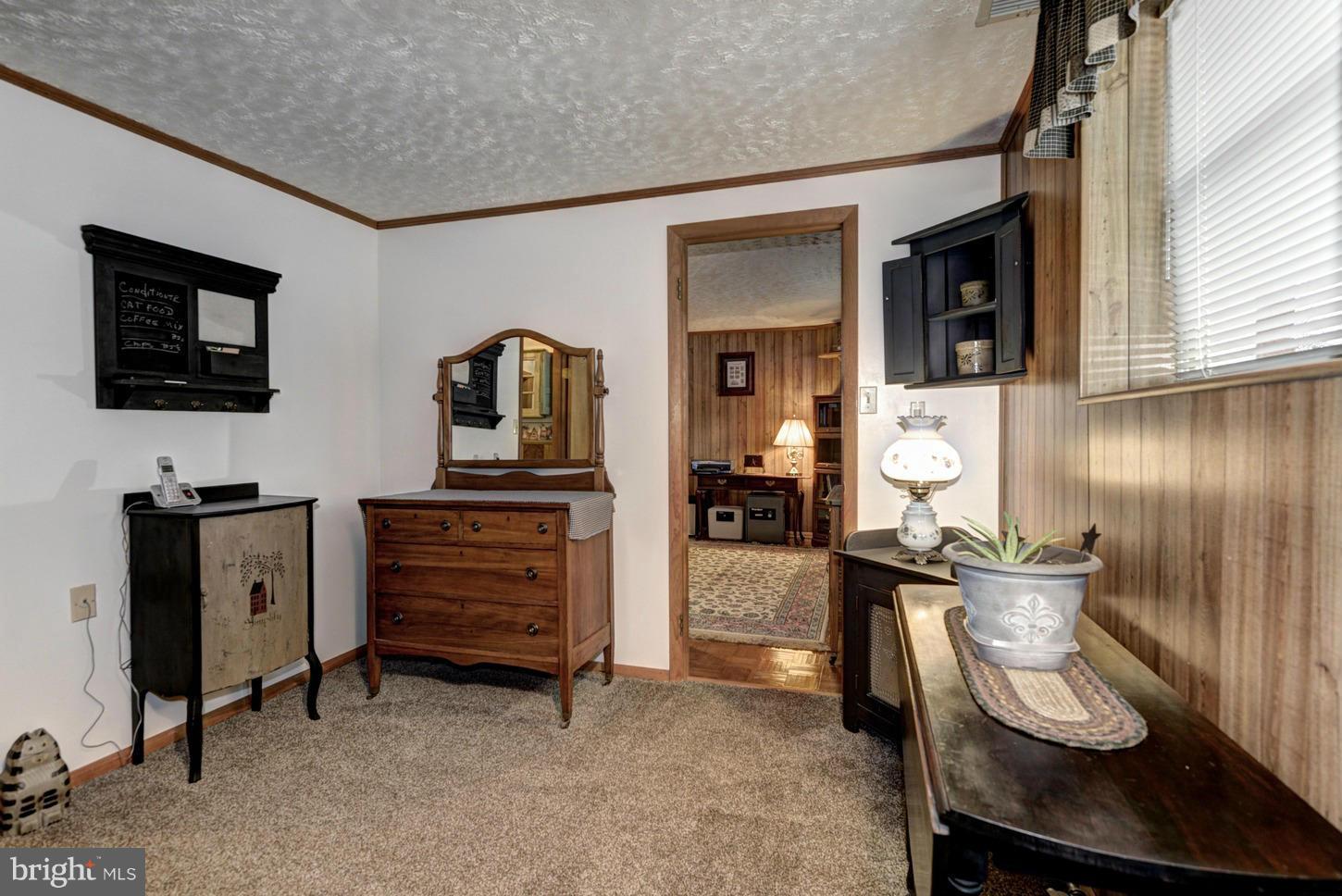 4115 Baptist Road Taneytown, MD 21787 - Photo 22 of 30 a view of a workspace with furniture and a window