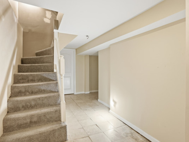 7118 South Indiana Avenue Chicago, IL 60619 - Photo 17 of 22 a view of an entryway with staircase