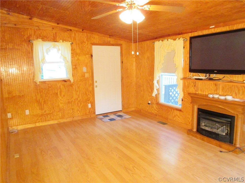 15413 Saddlebrook Road Chesterfield, VA 23838 - Photo 17 of 39 a view of an empty room with a fireplace and a window